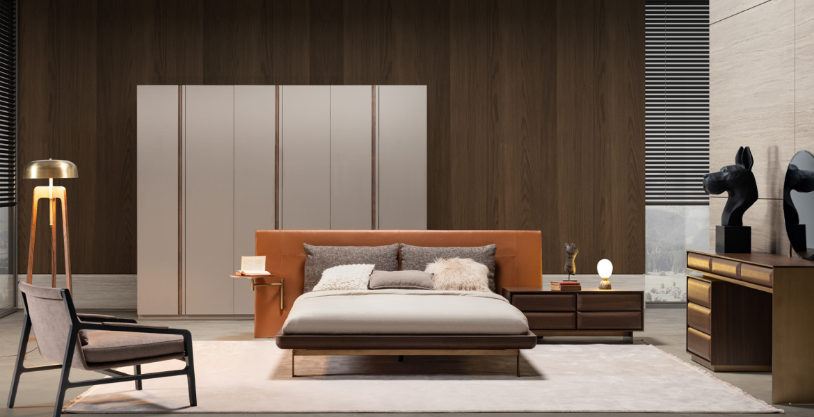 Contemporary Era Luxury Bedroom featuring leather headboard, wooden dresser, and warm ambient lighting.