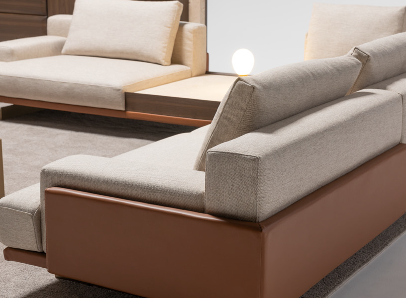 Luxury interior featuring Era Corner Sofa set with marble coffee table.