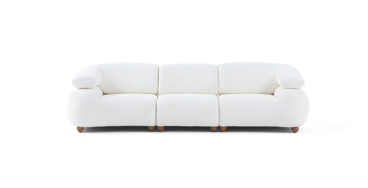 Contemporary space with Luna Sofa set and sculptural mirror above sideboard.