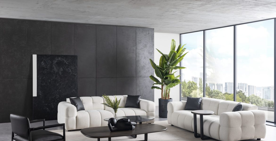 Living space showcasing Rita Sofa set and decorative vases.