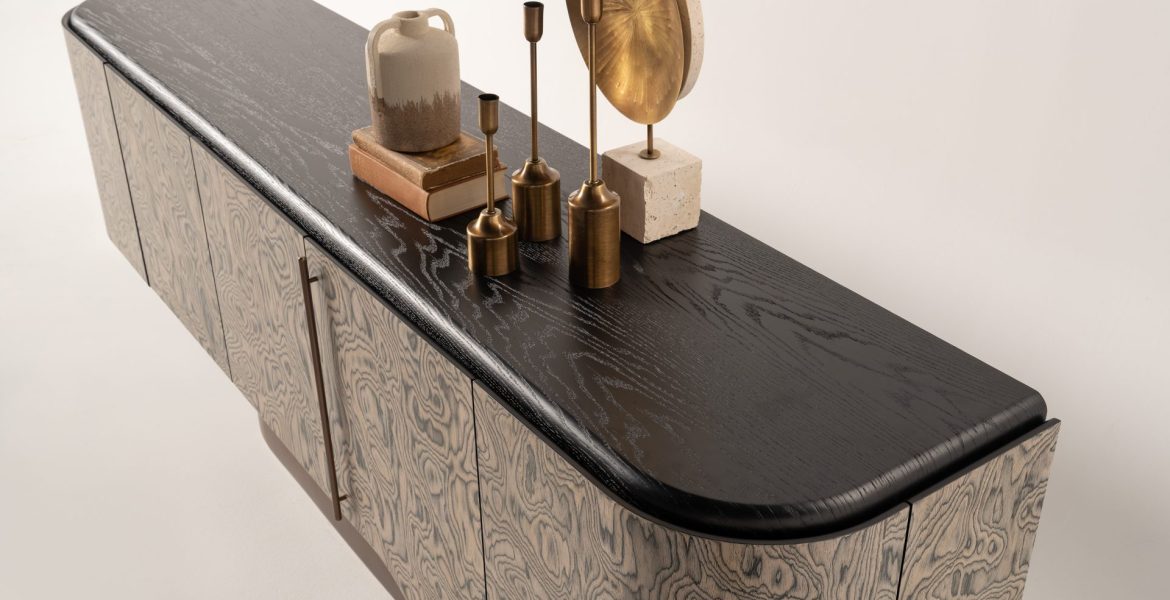 Noa Dining Room Furniture featuring sculptural table and patterned sideboard.