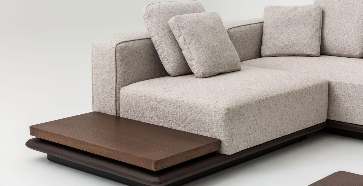Soft upholstered sofa with structured edges.