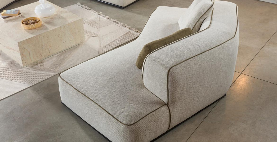 Beige upholstered sofa with plush seating.