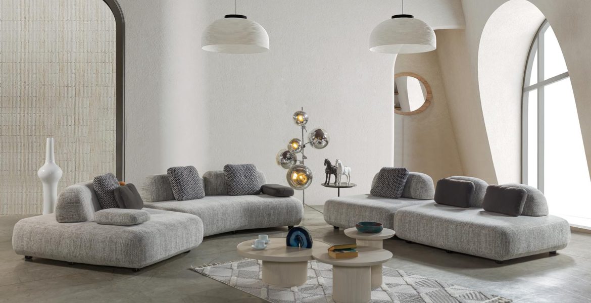 L-shape Sofa set paired with round coffee tables.