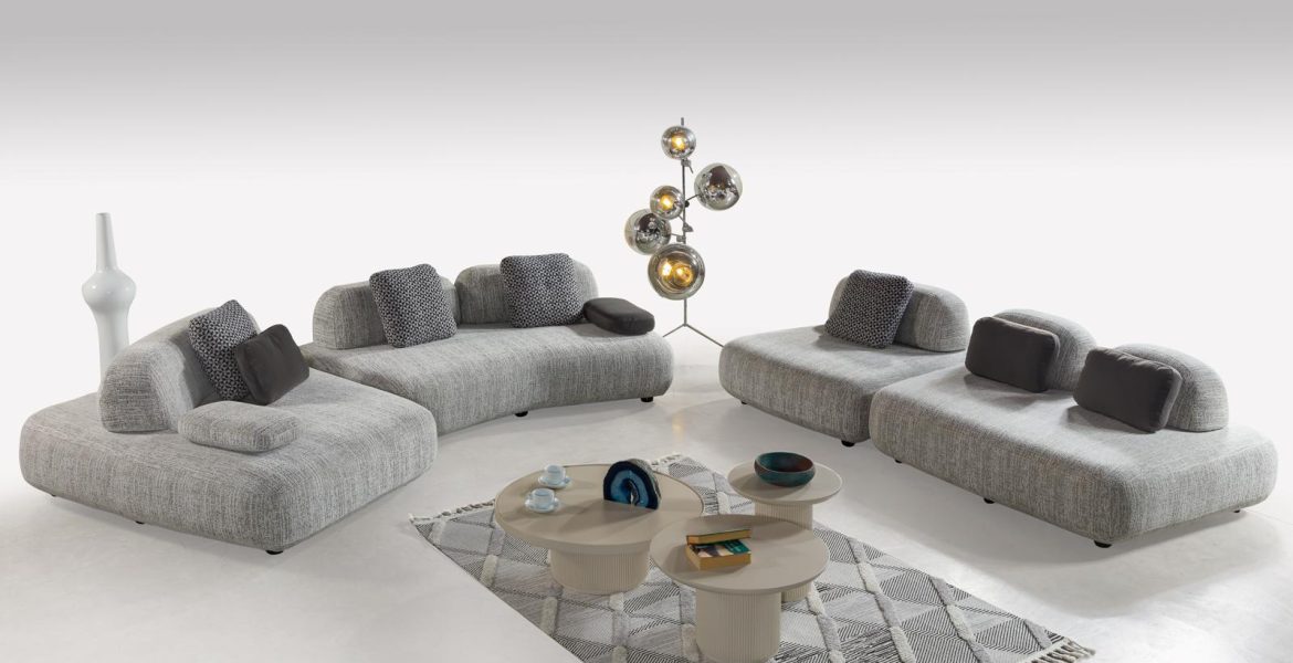 Sculptural floor lamp with metallic spheres.