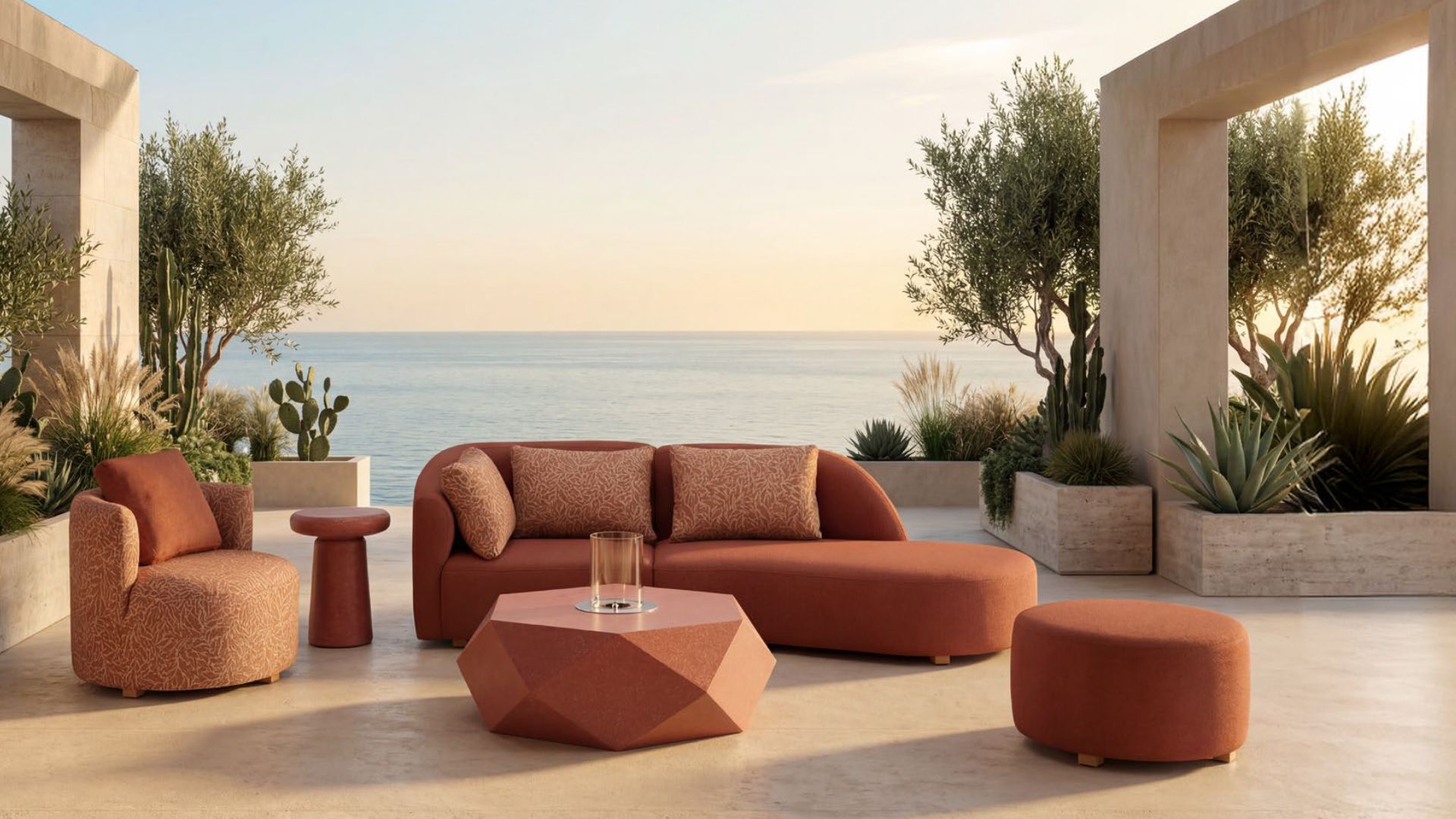 Modern outdoor sofa and armchairs with durable frames and neutral cushions.