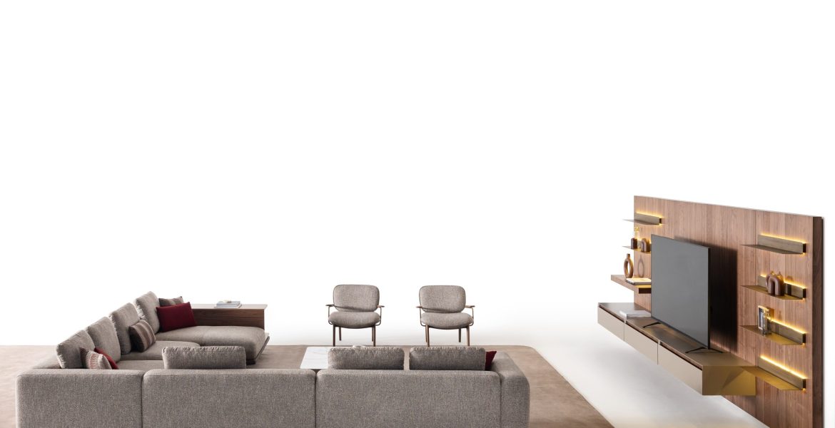 Lounge chairs with wooden frames and fabric cushions.