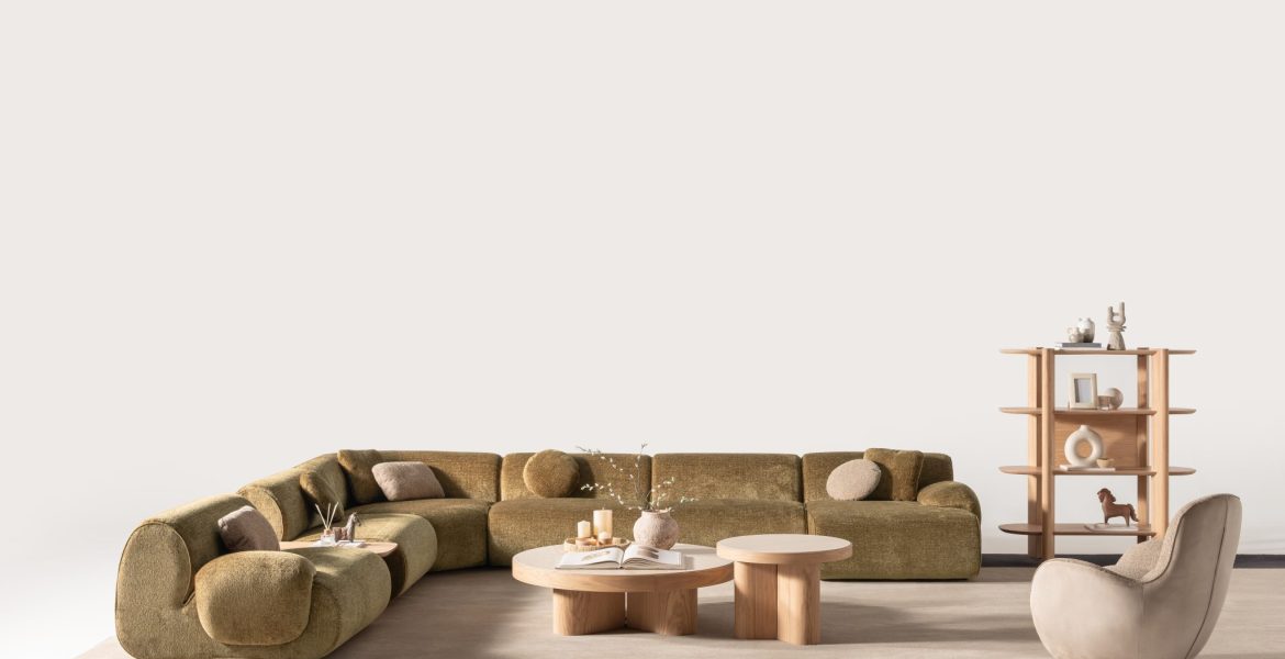 Corner sofa paired with round coffee tables.