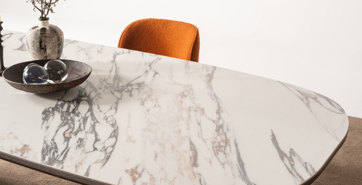 Modern dining sideboard with sculptural black legs.