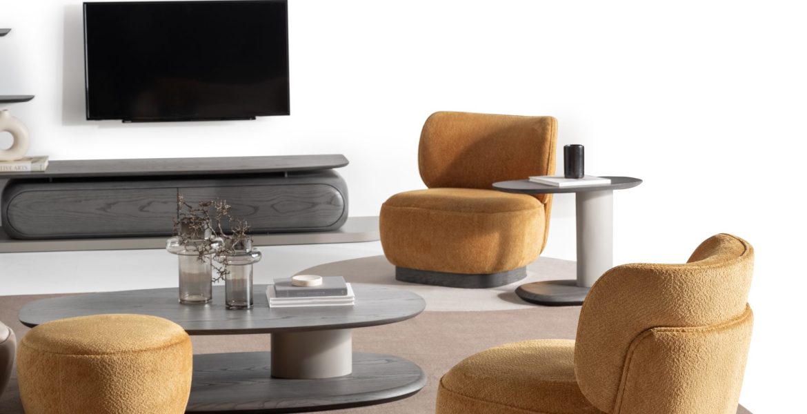 Soft upholstered sofa with curved edges.