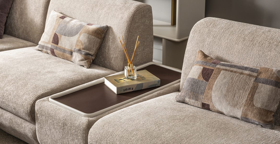 Soft upholstered sofa with curved edges.