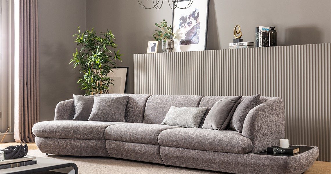 Large sofa paired with minimalist coffee table.