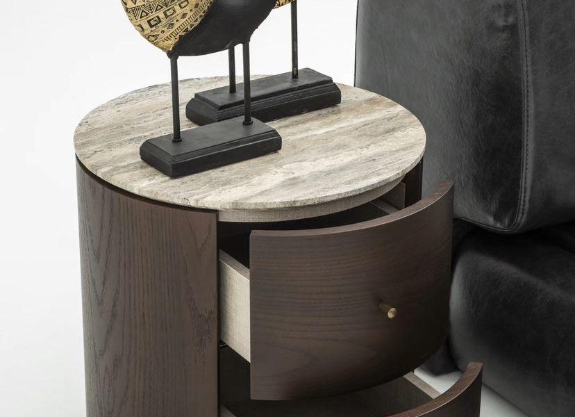 Bed paired with wooden nightstands.