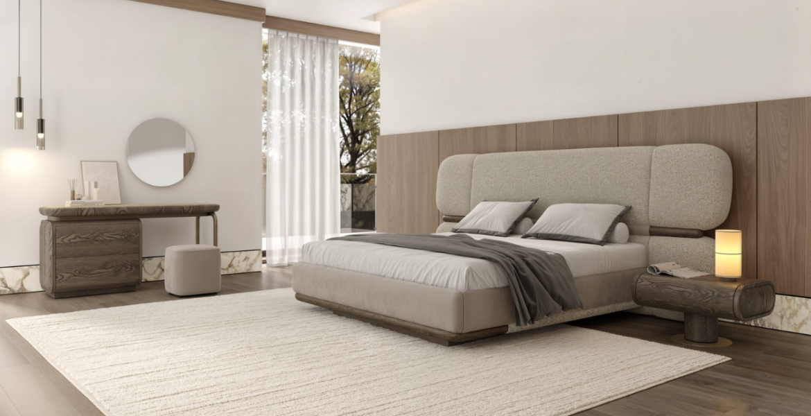 Upholstered bed with wooden base and soft headboard.
