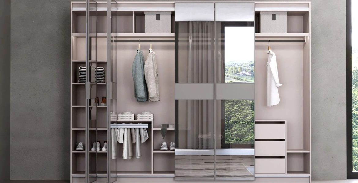 Mirrored wardrobe with sliding doors.