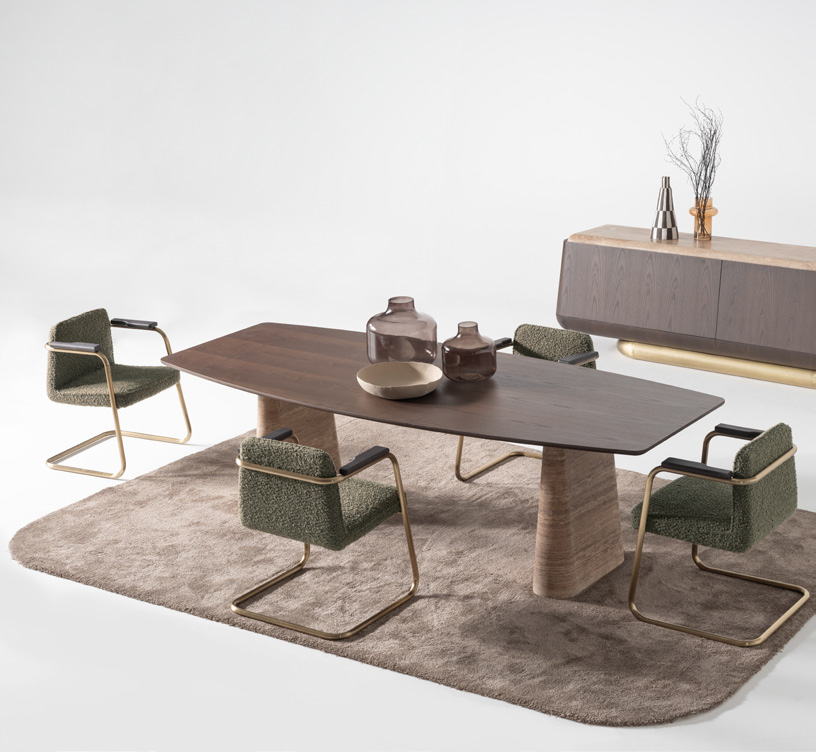 Wooden dining table with conical legs.