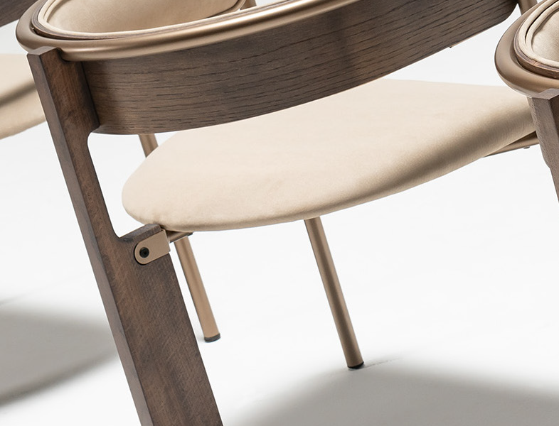 Contemporary dining table with minimalist wooden top.