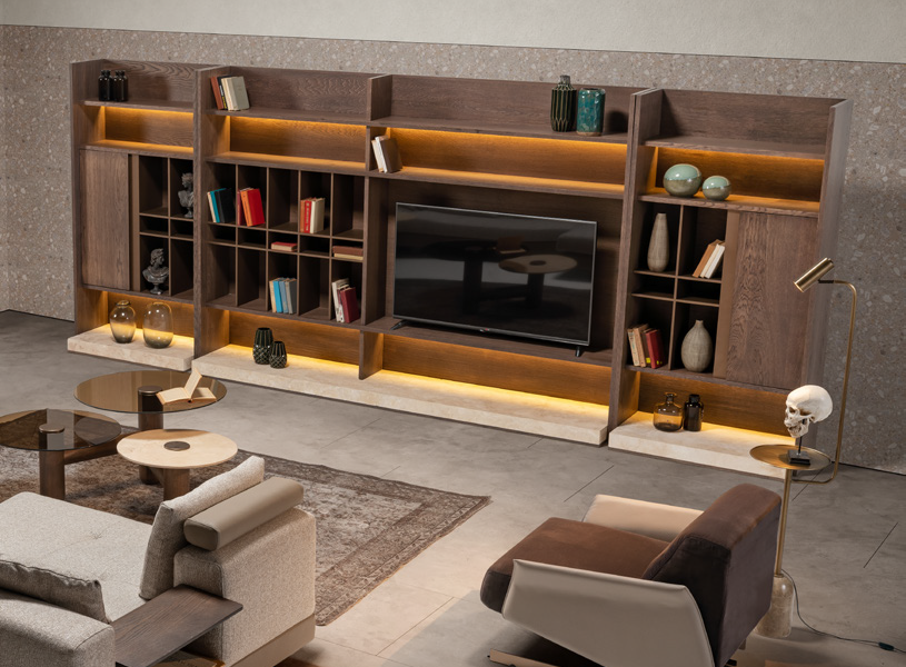 Curved‑back dining chairs with light upholstery.