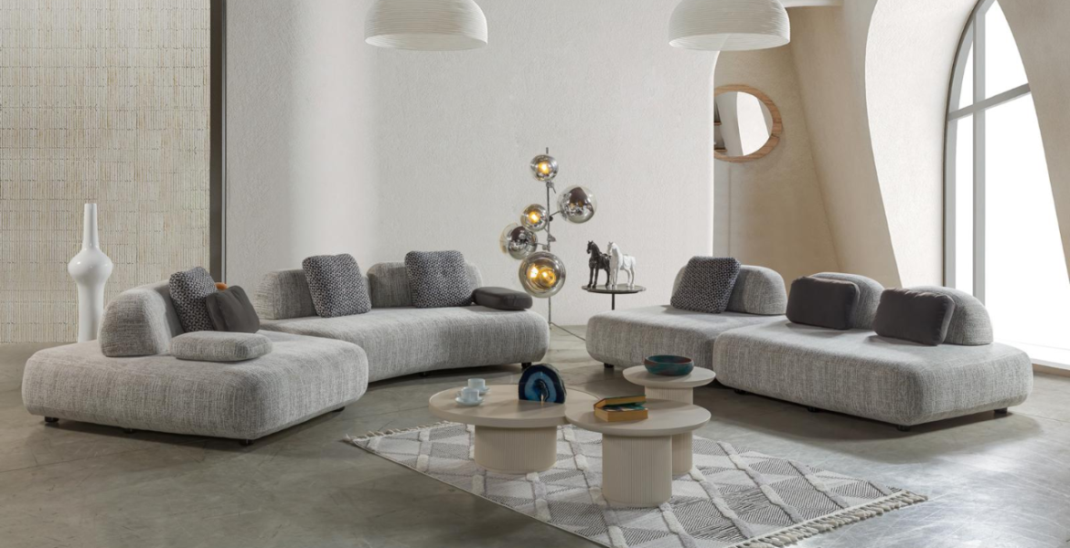 Genesis Living Room Furniture featuring sofa and tables.