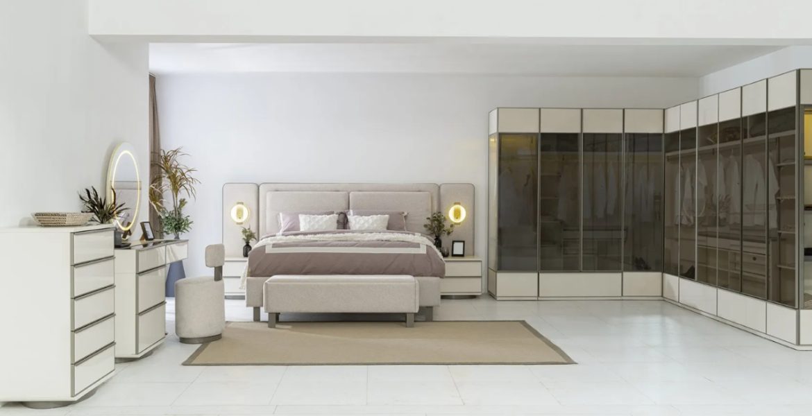 Mirrored wardrobe with sliding doors.