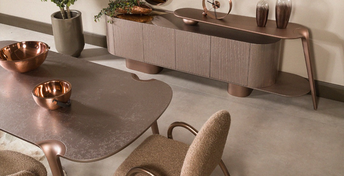 Platinum Dining Room Furniture set with sculptural base.