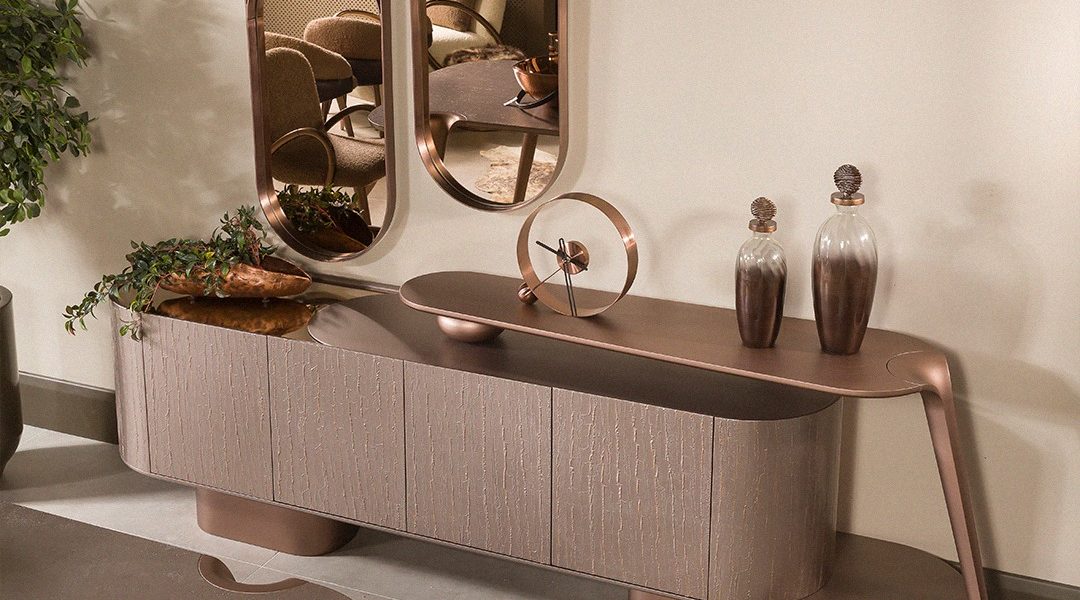 Curved bronze dining sideboard with textured beige panels.