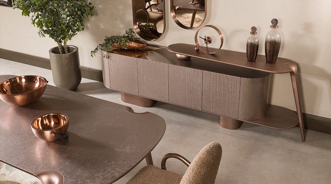 Modern sideboard with curved design and mirror accents.